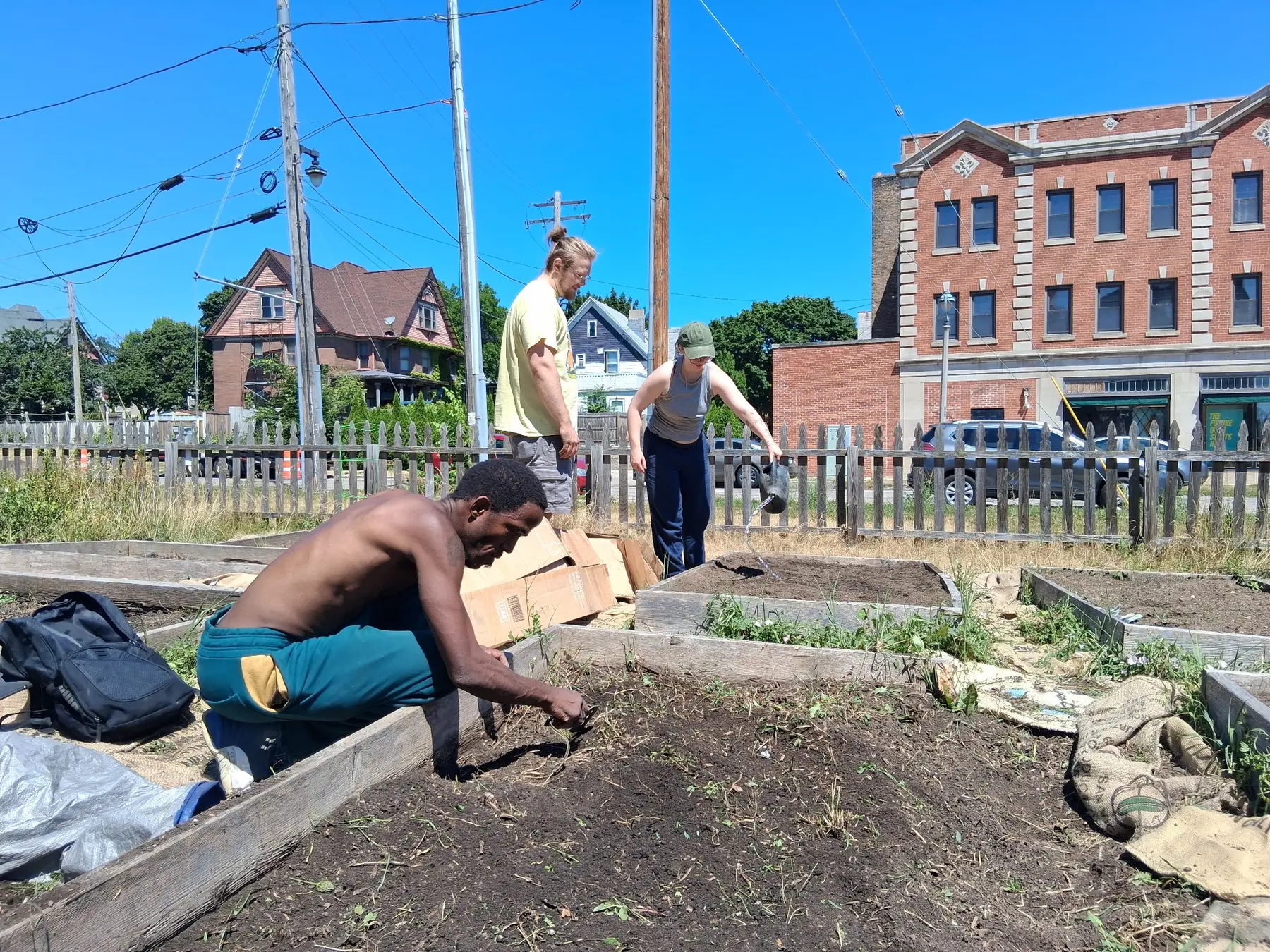 YAGI volunteers working together to prepare community garden beds